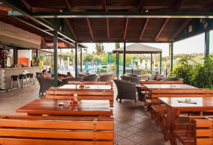 Отель Nikos Villas