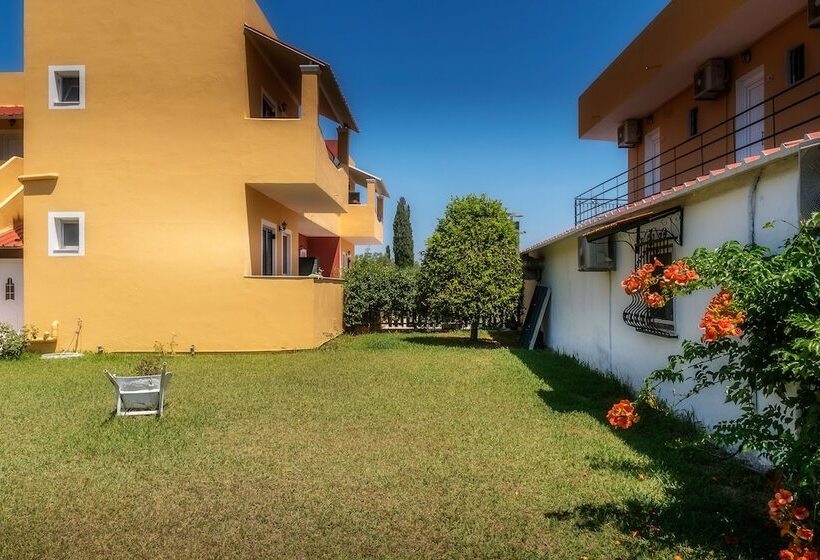 Отель Nikos Villas