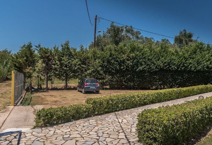 Отель Nikos Villas