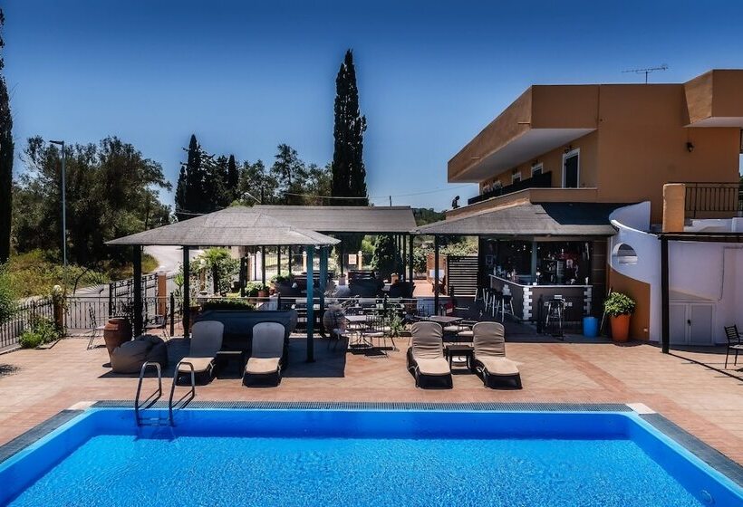 Отель Nikos Villas