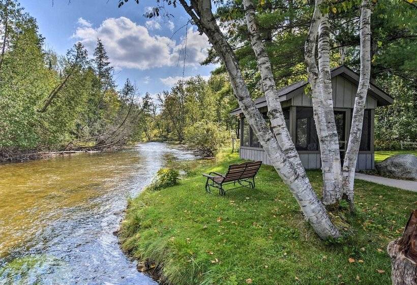 Riverfront Traverse City Cabin Near Snowmobiling!