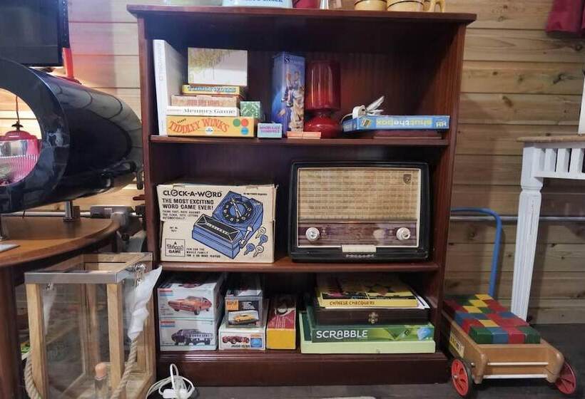 A Quirky Garden Building In An Orchard