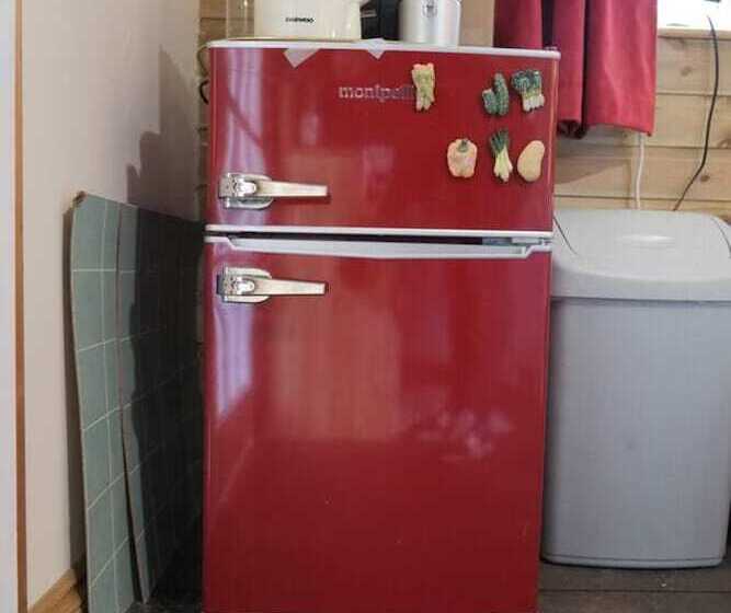 A Quirky Garden Building In An Orchard