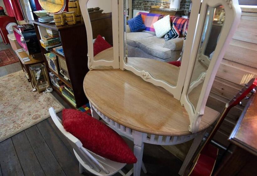 A Quirky Garden Building In An Orchard