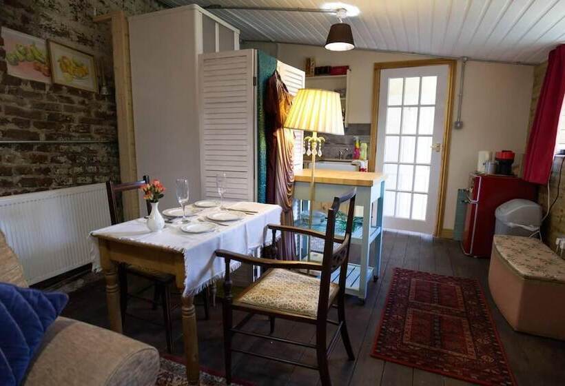 A Quirky Garden Building In An Orchard