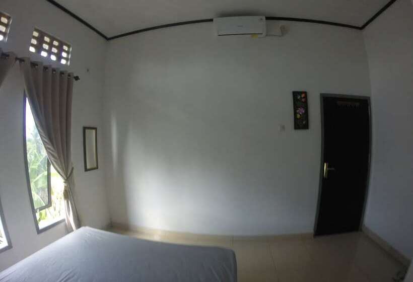 בית מלון כפרי Artha Homestay Tomia