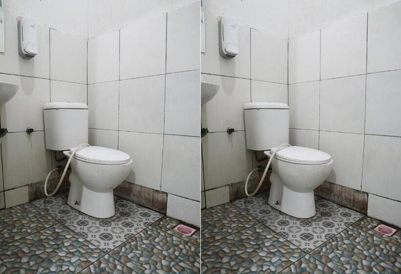 Отель Oyo 92831 Penginapan Raja