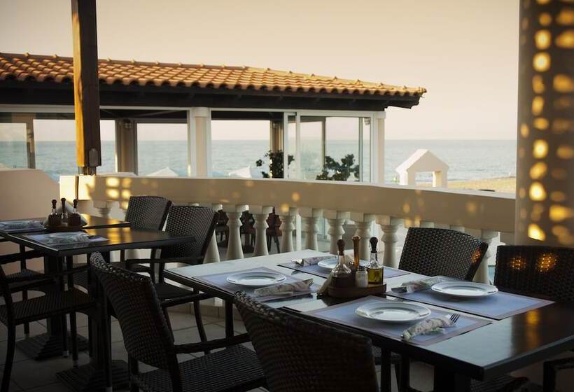 Отель Caretta Beach