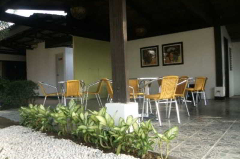 Отель Fern Garden Suites