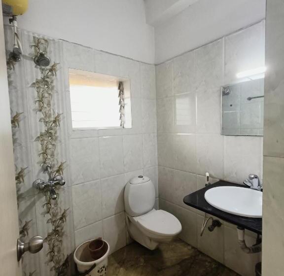 호텔 Reliance Guest House