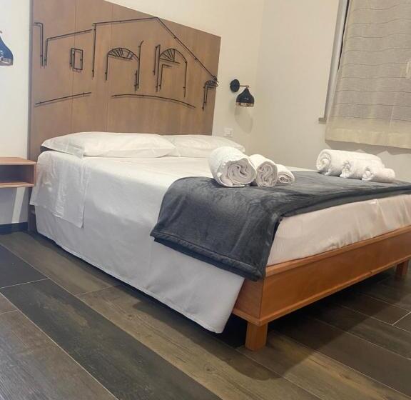 تختخواب و صبحانه Rudini Charming