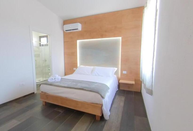 تختخواب و صبحانه Rudini Charming