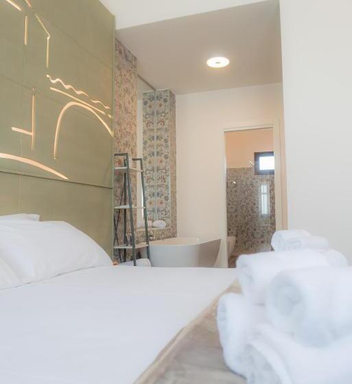 تختخواب و صبحانه Rudini Charming