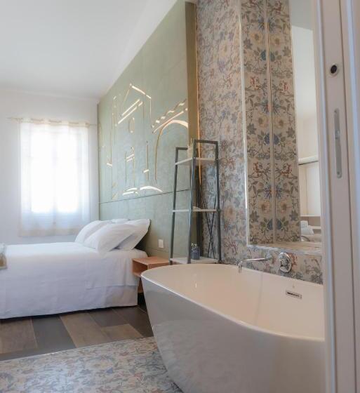 تختخواب و صبحانه Rudini Charming