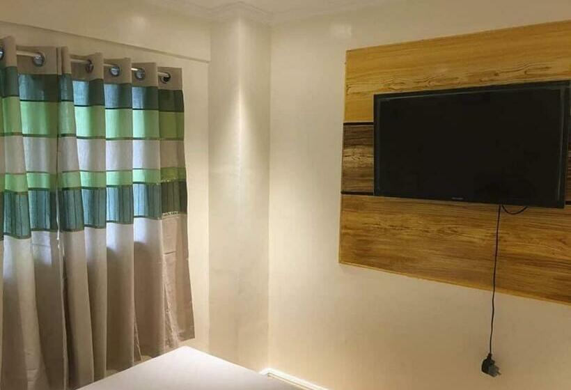 فندق صغير Rj Travellers Inn