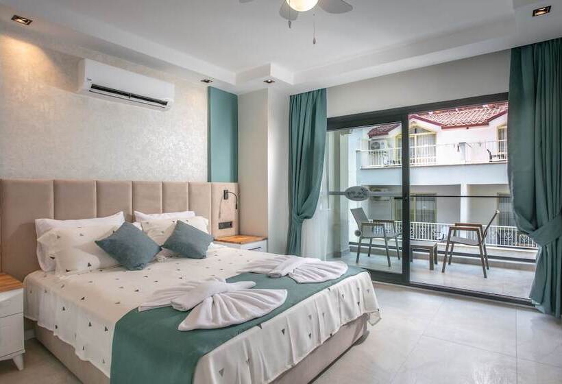 Отель The Ivy Suites