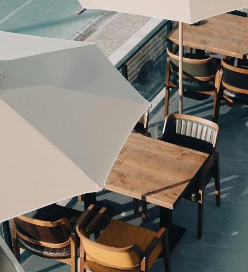 Отель The Ivy Suites