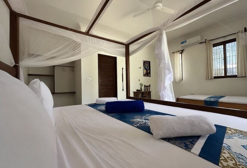 مبيت وإفطار Amber Lodge