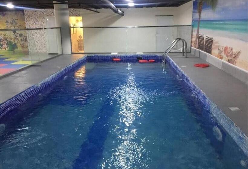 اجنحة المغيب الفندقية حي التعاون