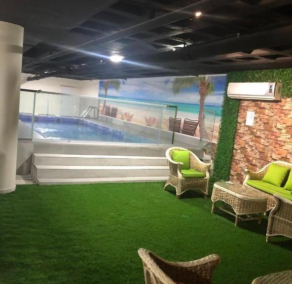 اجنحة المغيب الفندقية حي التعاون