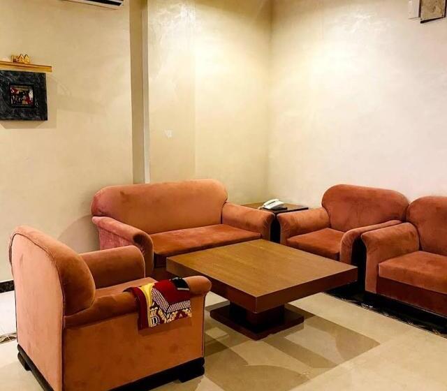 اجنحة المغيب الفندقية حي التعاون