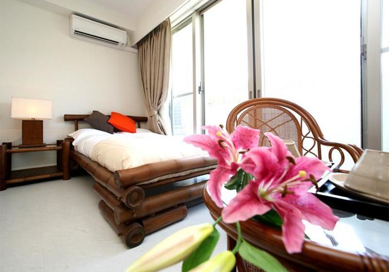 Отель Amami Resort Thida Moon