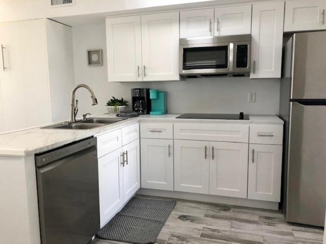 Отель Treasure Island Beach Club 727 360 7096