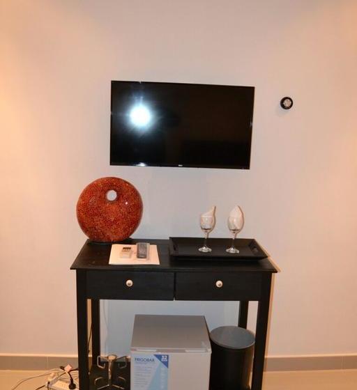 Отель Tobuna Suites