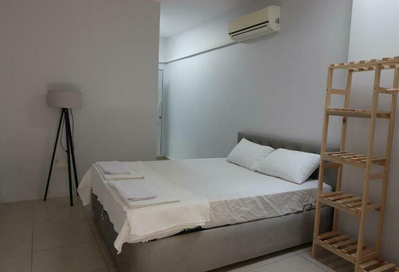 מלון כמוסות Power Suit