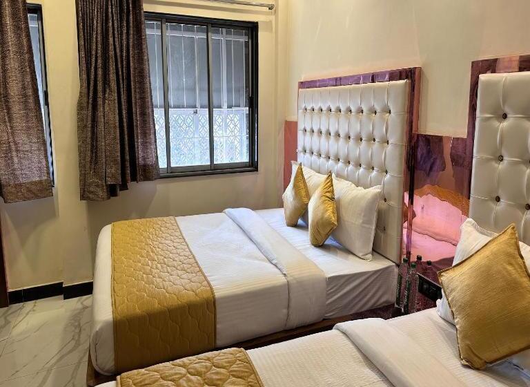 בית מלון כפרי Orchid Inn,mumbai