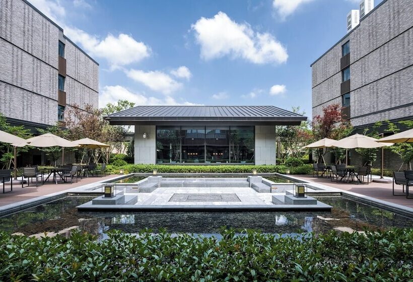 Отель Hentique Manna Tangshan