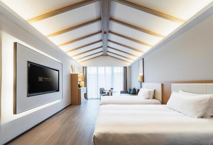 Отель Hentique Manna Tangshan