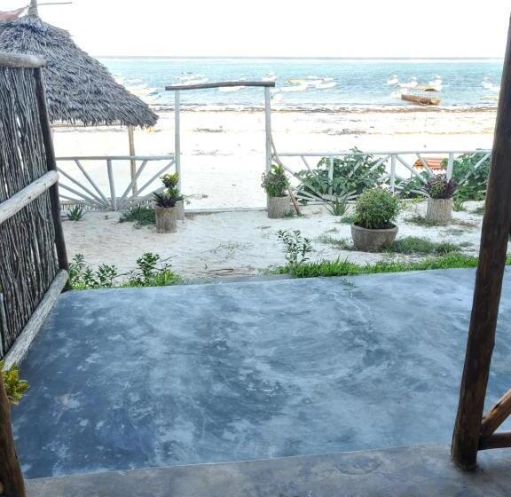 Капсульный Oтель Kibwana Village Bungalows