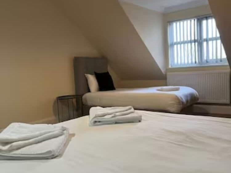 פנסיון Relaxing Airport Rooms