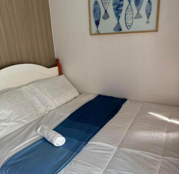 Art S Nest At Shore Residences