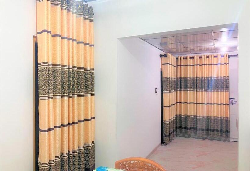 호스텔 Grand Refuge Holiday Rooms