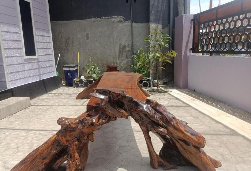 Отель Capital O 93118 Asera Homestay