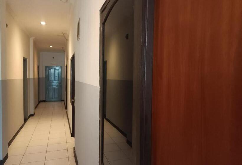 Отель Oyo 93090 Multi Plus Inn