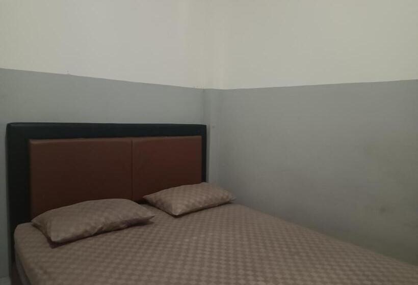 Отель Oyo 93090 Multi Plus Inn