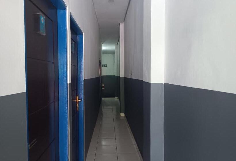 בית מלון כפרי Oyo 93117 Penginapan Tiga Dara