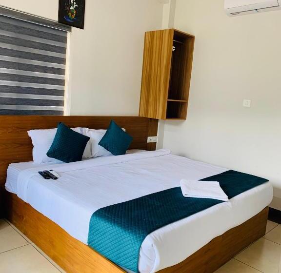 호텔 Regalia Wayanad