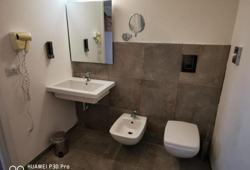 تختخواب و صبحانه Residence Il Carrubo