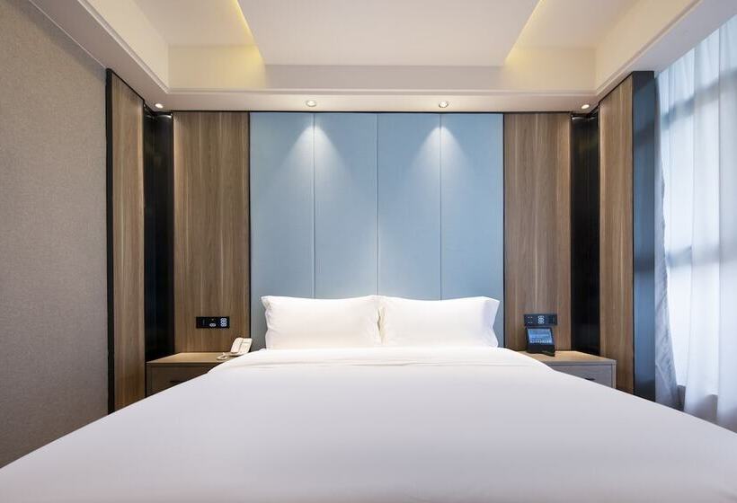 ホテル Kunyixingguangjiudian