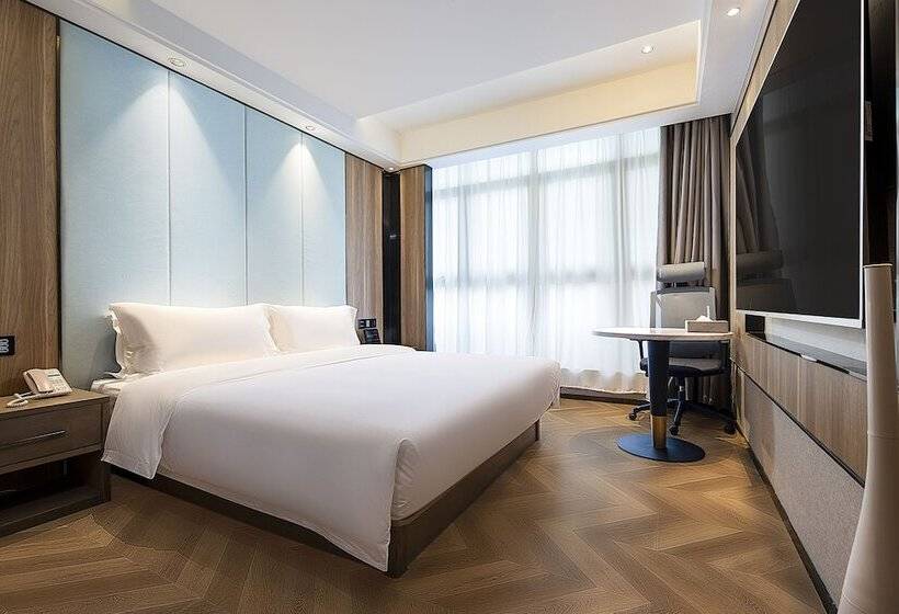 ホテル Kunyixingguangjiudian