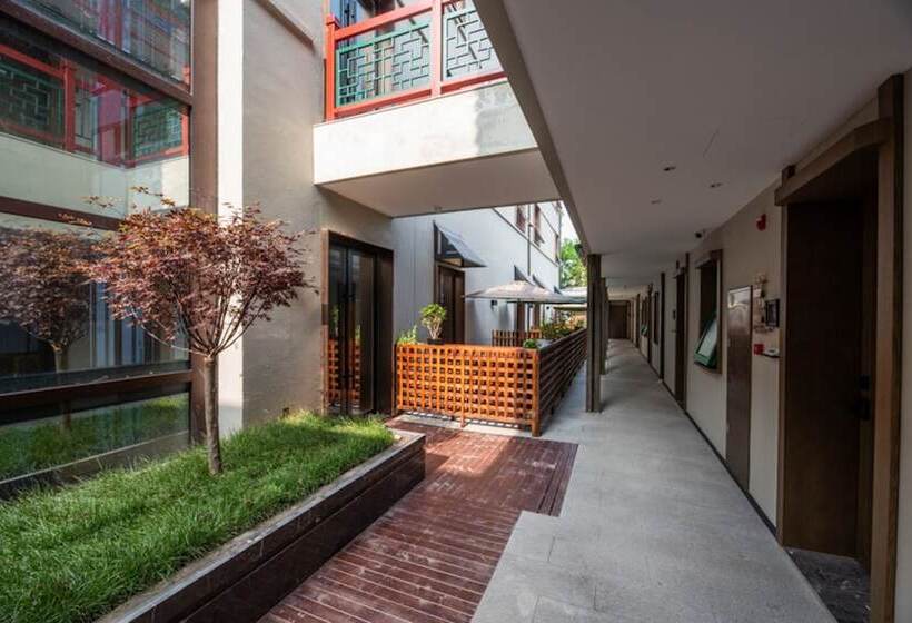 Отель Beijing Wangfujing Heyuan Manxinfu