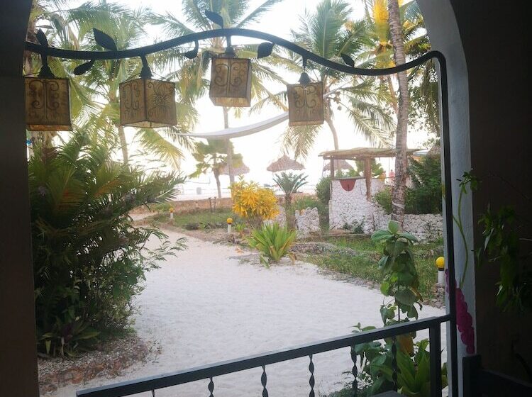 בית מלון כפרי Mambo Ocean Resort