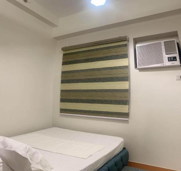 هتل Four Angels  Staycation In Trees Residences Near Sm Fairview