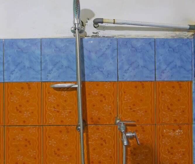 Отель Spot On 92462 Awenk Homestay Near Sd Gunung Wakul