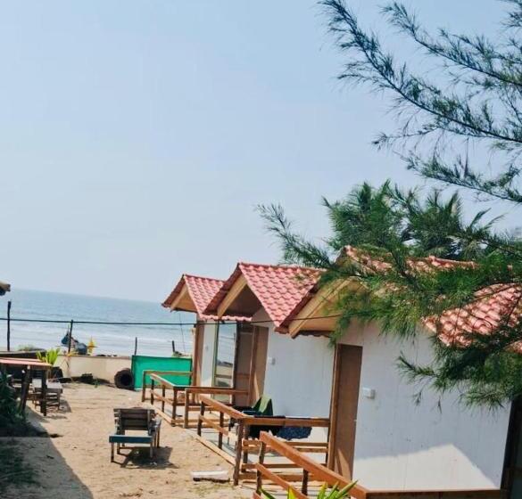 هتل Om Beach Cottages