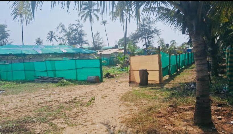 هتل Om Beach Cottages